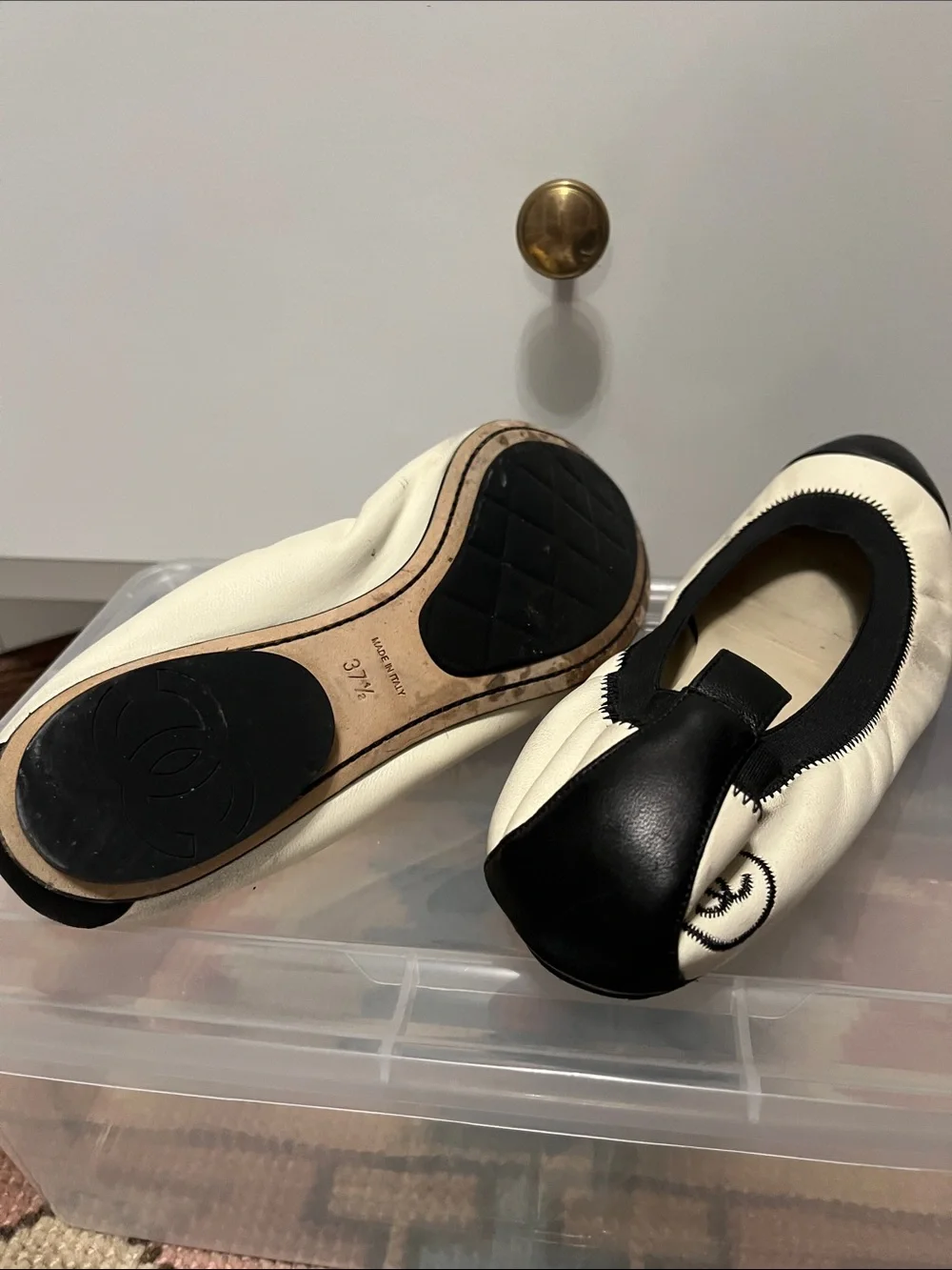 CHANEL Cream Leather Ballet Flats with Black Cap Toes